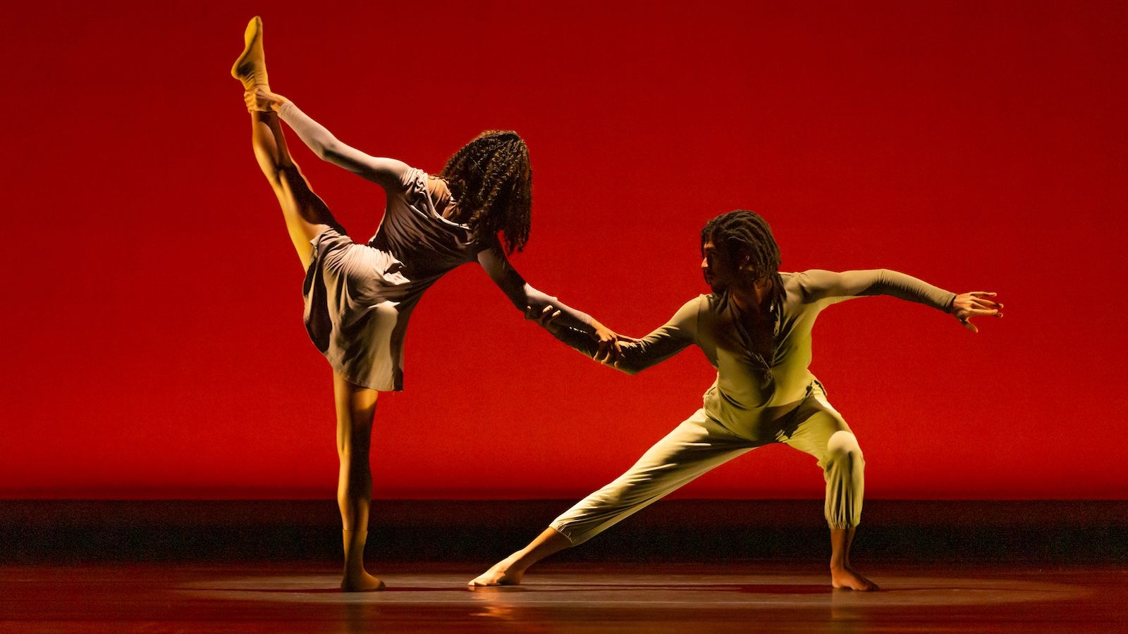 a male and female dancer dance on stage