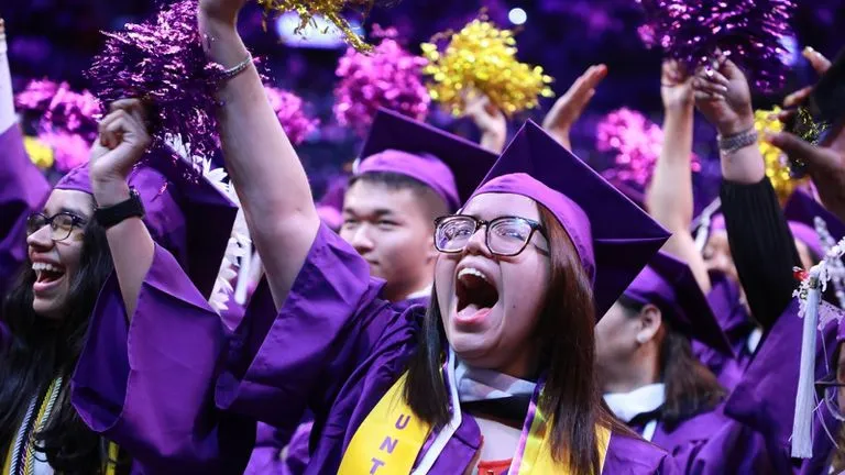 Graduates cheering