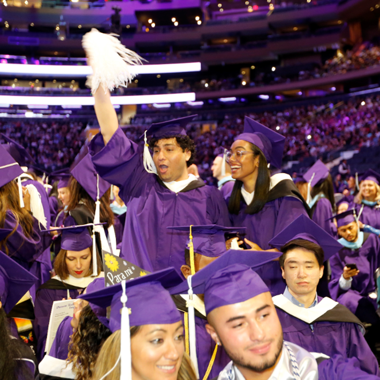 Photo - Graduating Hunter students cheer at Commencement