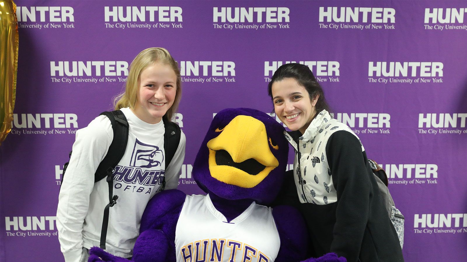 student athletes with Hawk