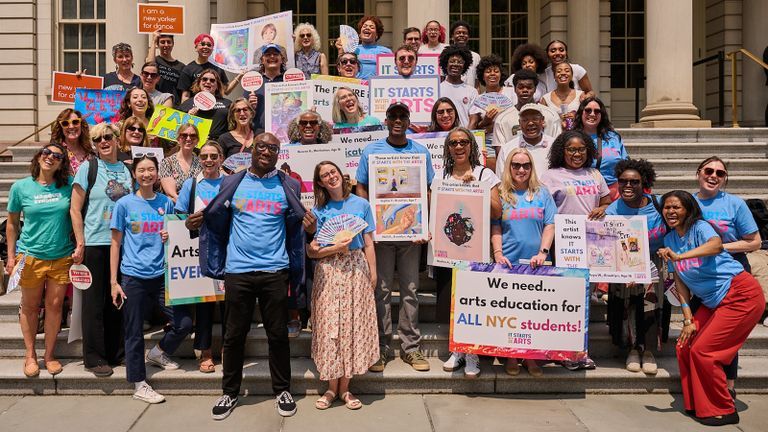 Arts in Education Roundtable Volunteers pose for a photo.