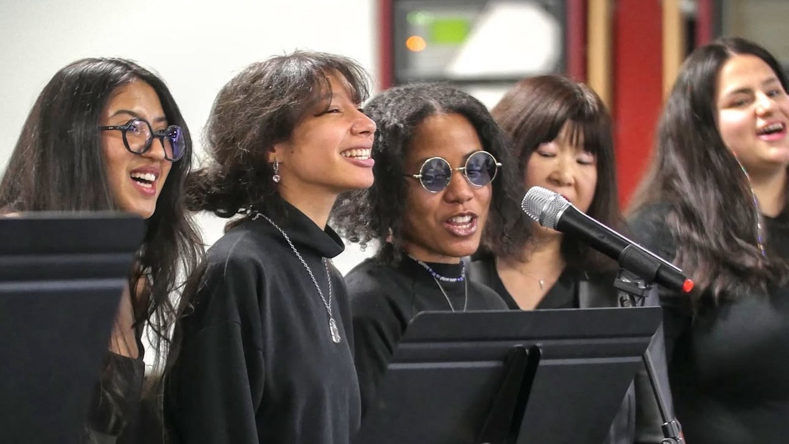 Hunter students singing at an event.