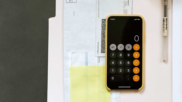 smart phone calculator on paperwork