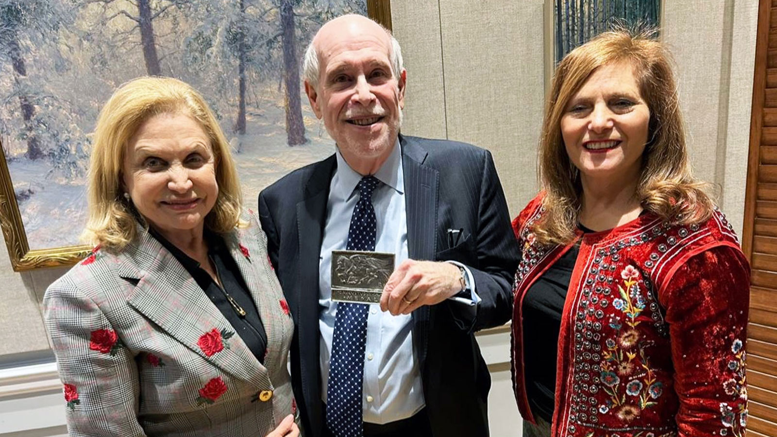 Harold Holzer is flanked by former Rep. Carolyn Maloney, left, and Hunter College President Jennifer Raab after receiving the Saint-Gaudens Medal on Jan. 9.