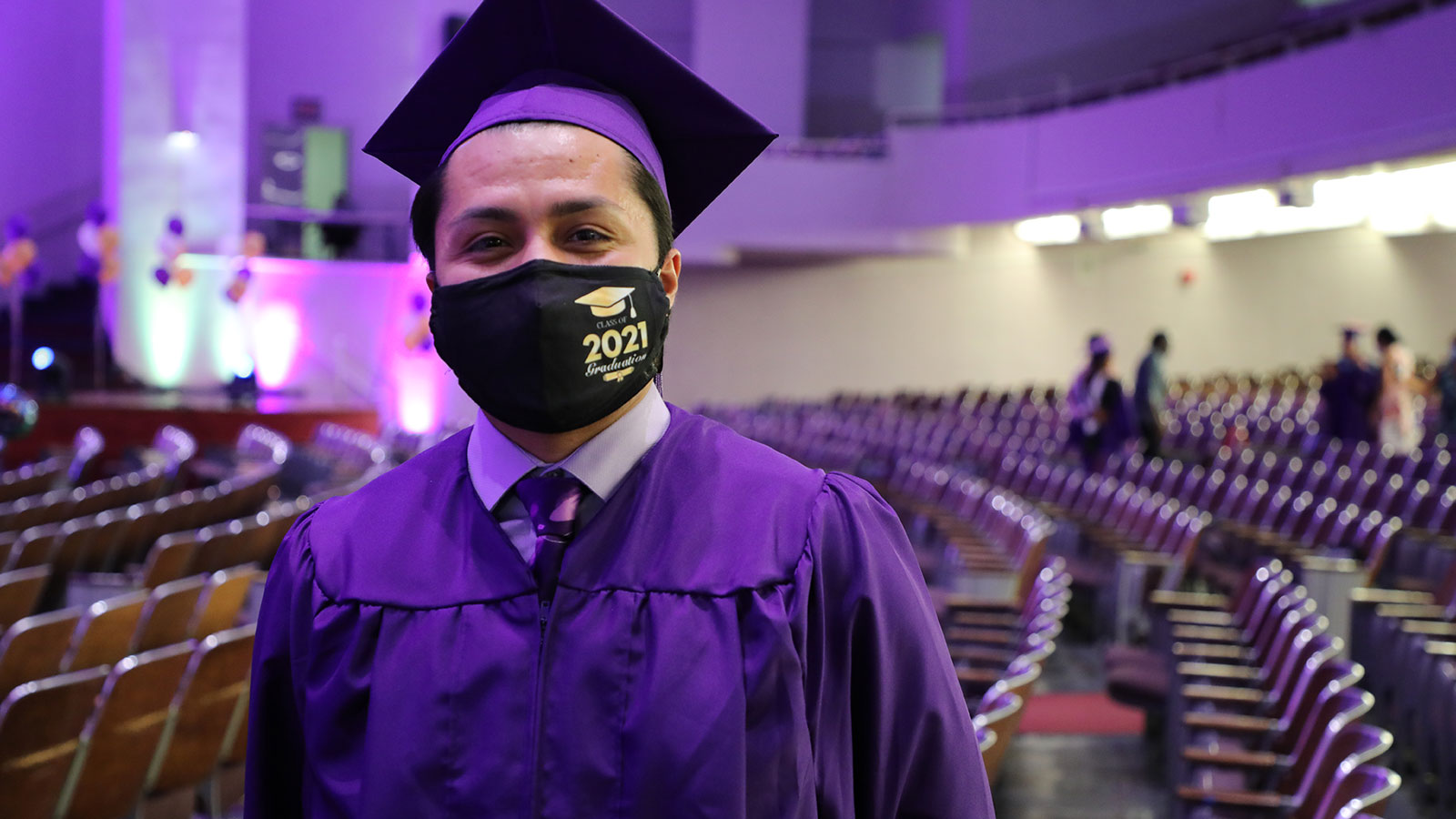 graduating student with mask