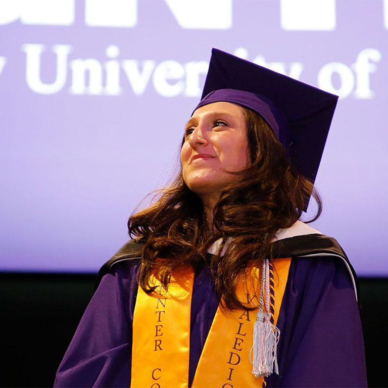 hunter student on stage with honors