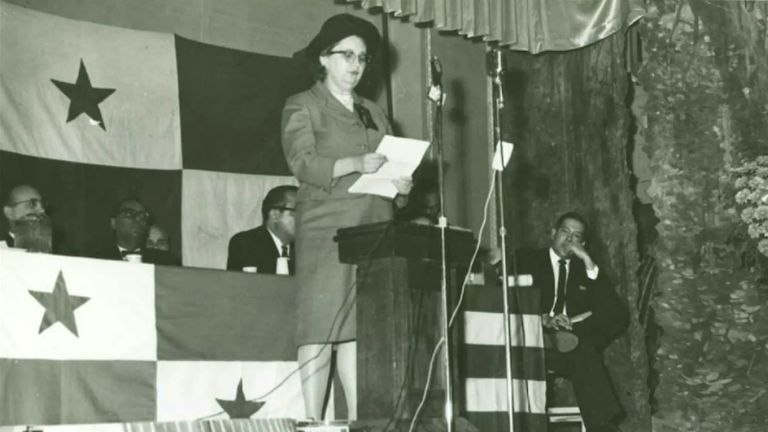 Image Credit: Ruth M. Reynolds Papers. Ruth M. Reynolds on a Podium. Center for Puerto Rican Studies Library & Archives, Hunter College, CUNY.
