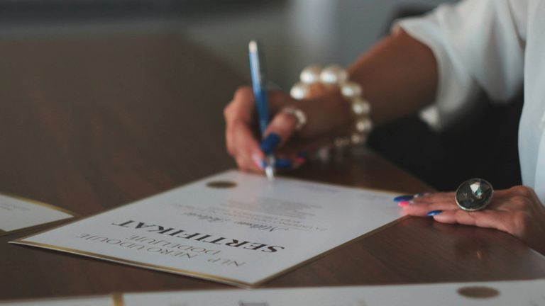 Person signing a certificate.