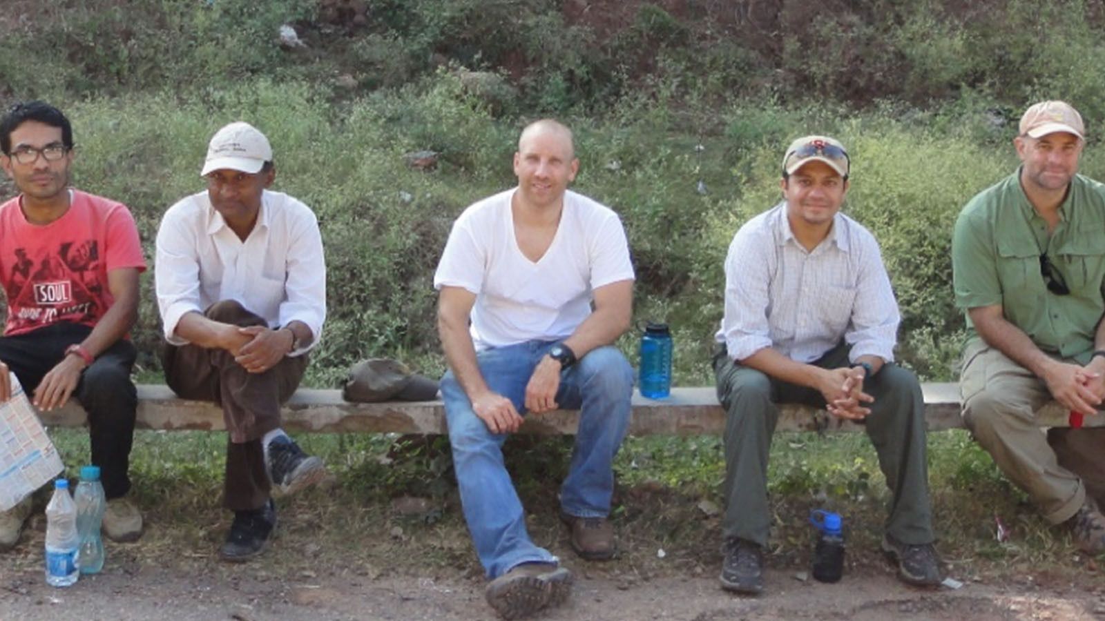 Professor Christopher Gilbert (center), at Ramnagar, is shown with members
of the team, including (from left) N. P. Singh, R. Patnaik, B. Patel, and C. Campisano.  


