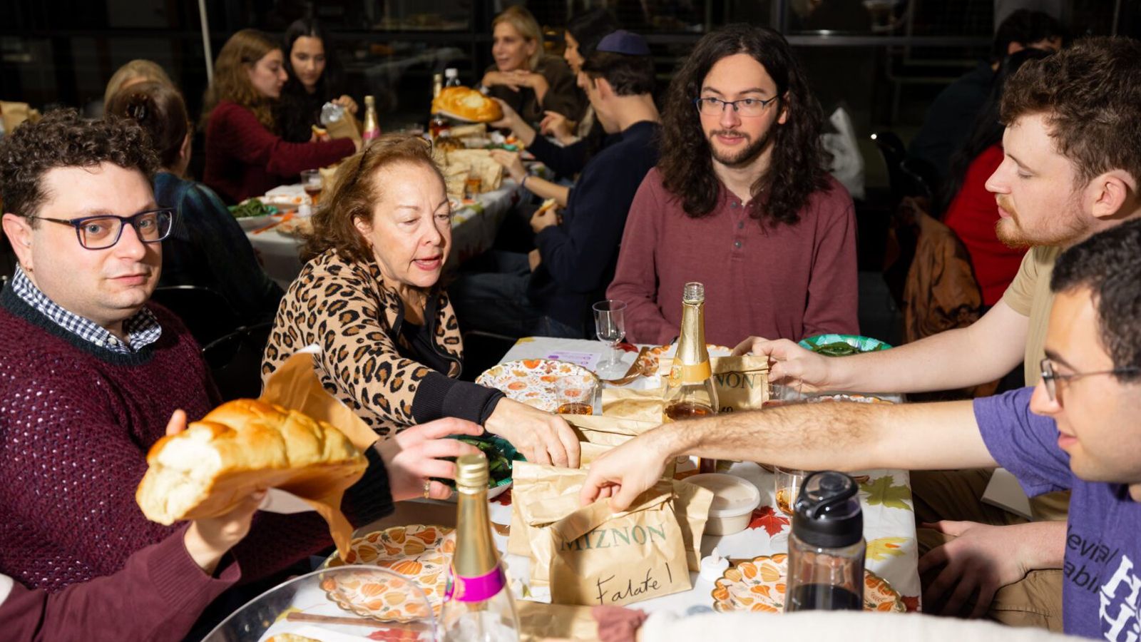 People sharing food around the table