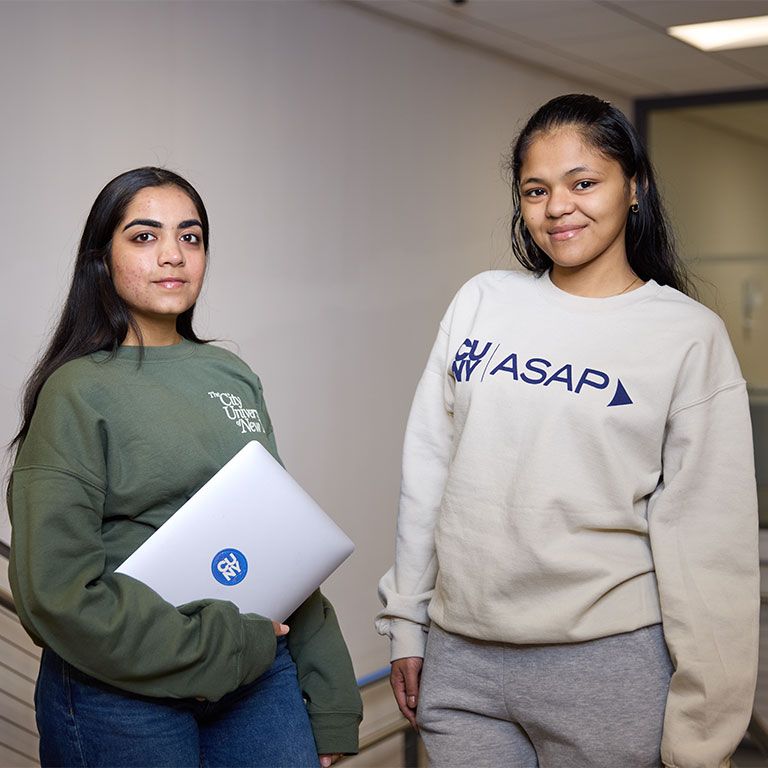 two students wearing cuny and cuny asap merch