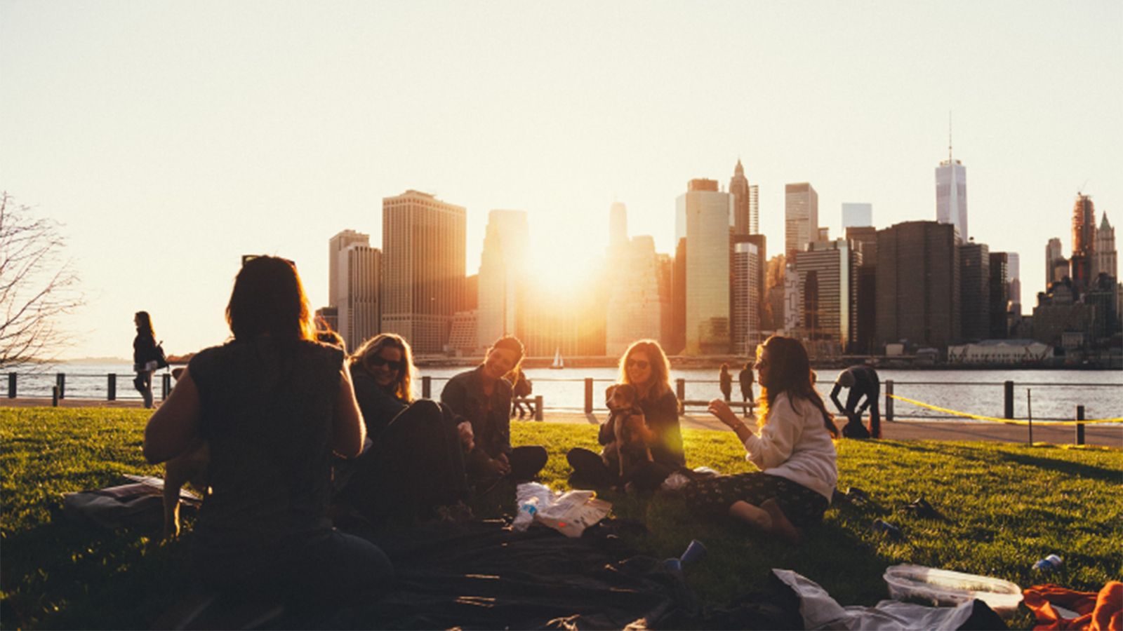 Photo of a group of students sitting on the grass and talking to illustrate Counseling Workshops