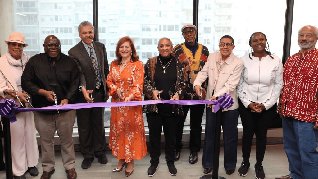(From left to right) Toni Peterson, Dr. Anthony Browne, Dean John Rose, Pres. Jennifer Raab, Prof. Joanne Edey Rhodes, Prof. Mark Payne, Dr. Milagros Denis-Rosario, Georgette Clarke, and Prof. Basir Mchawi