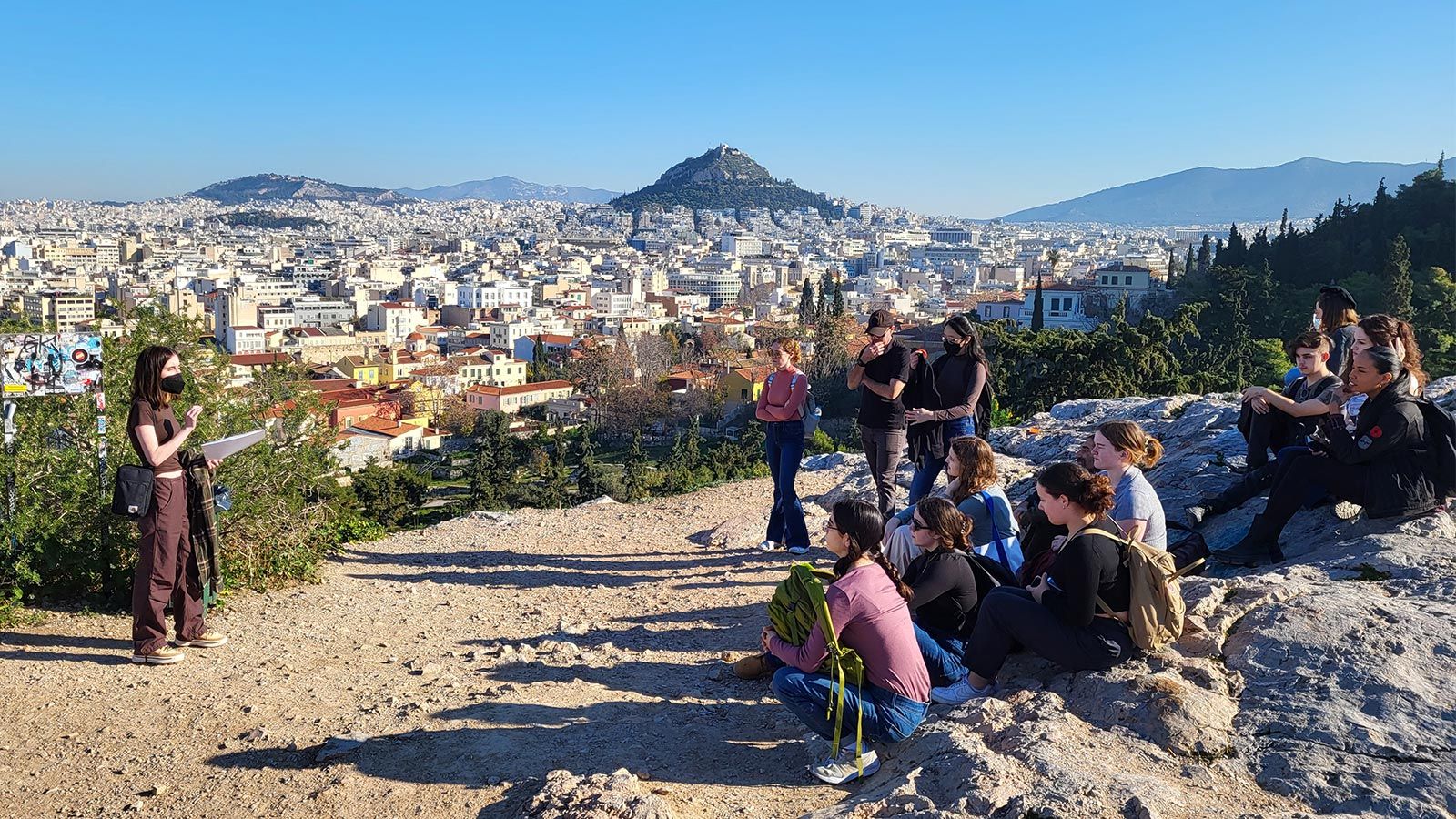 Photo - Hunter's Bluhm Scholars tour the Areopagus site northwest of the Acropolis in Athens, Greece.