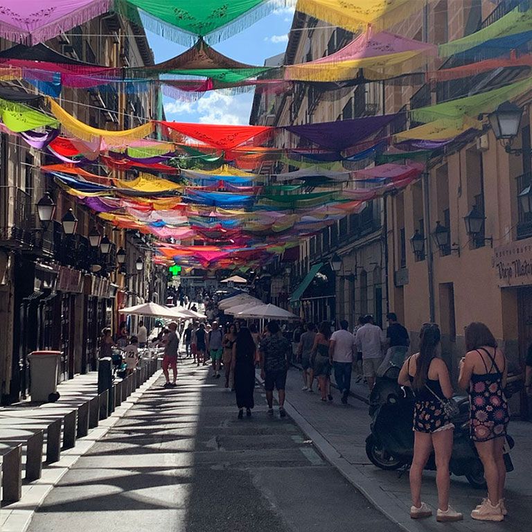 flags over walkway in Madrid