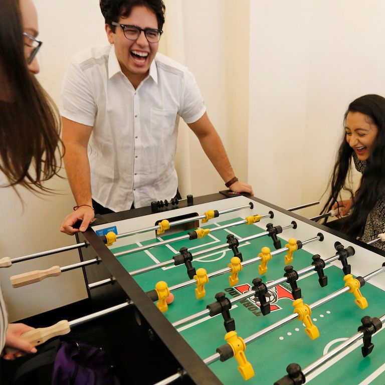 students playing foosball