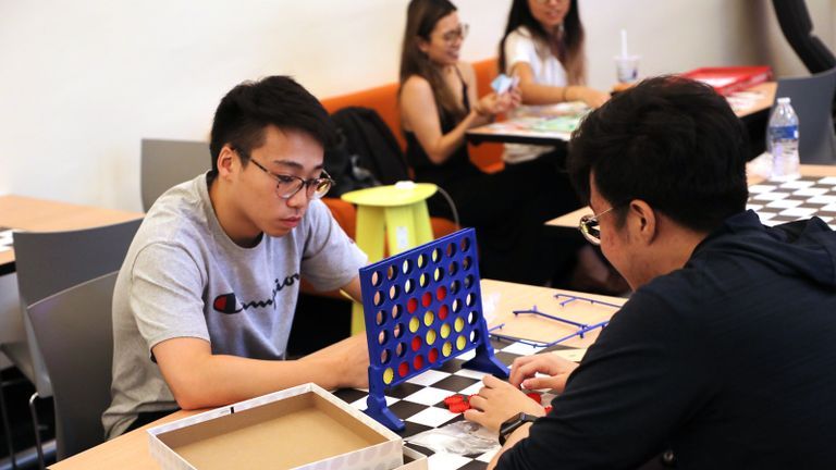 Photo - Hunter students play games in the Student Union Game Room.