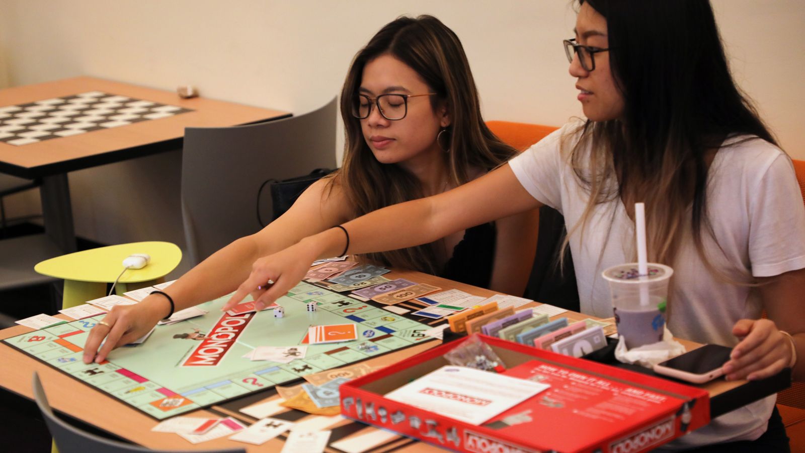 Photo - Hunter students play Monopoly in the Game Room