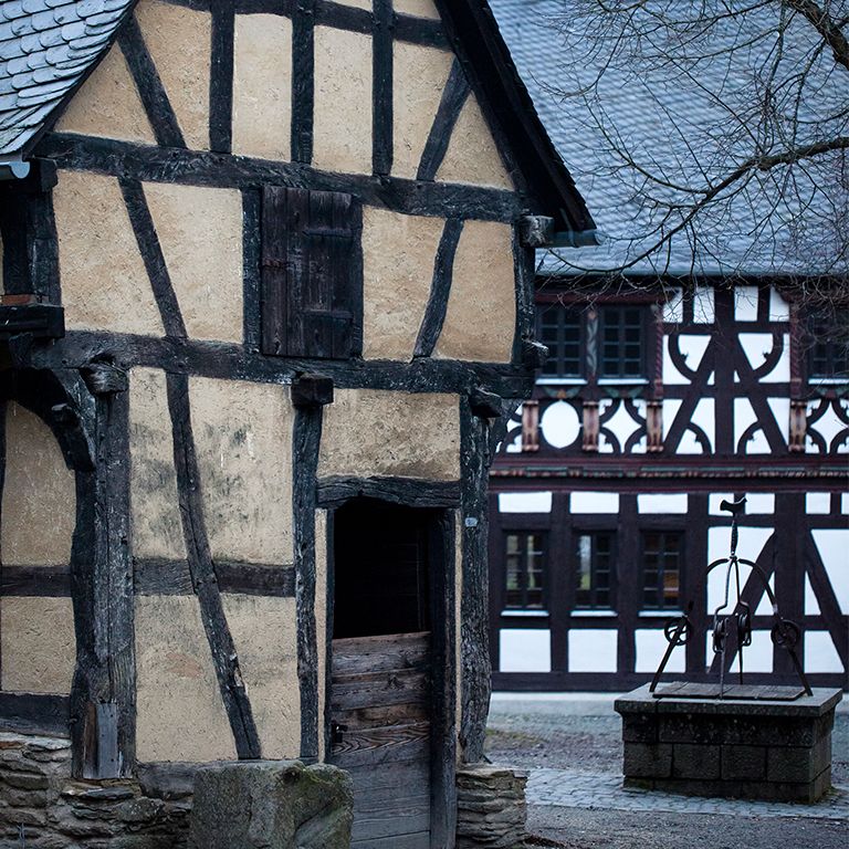 The exterior of an old German farmhouse.