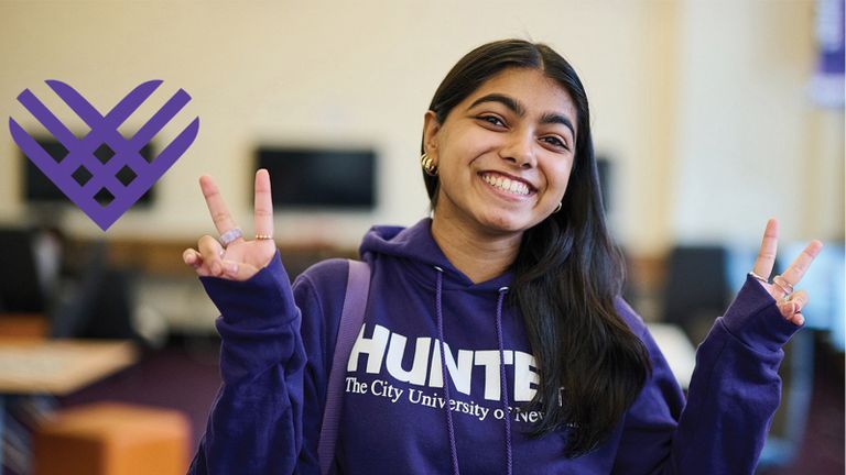Hunter student wearing Hunter hoodie smiling
