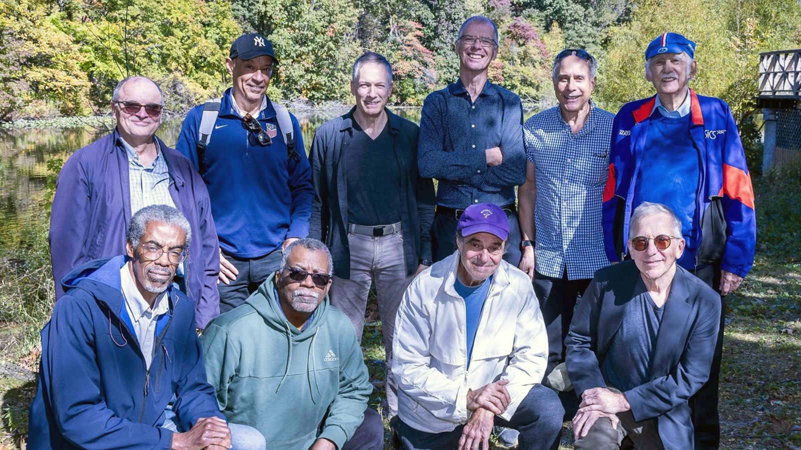 Hawk Track & Field veterans with Coach Vincent Chiappetta at upper right.