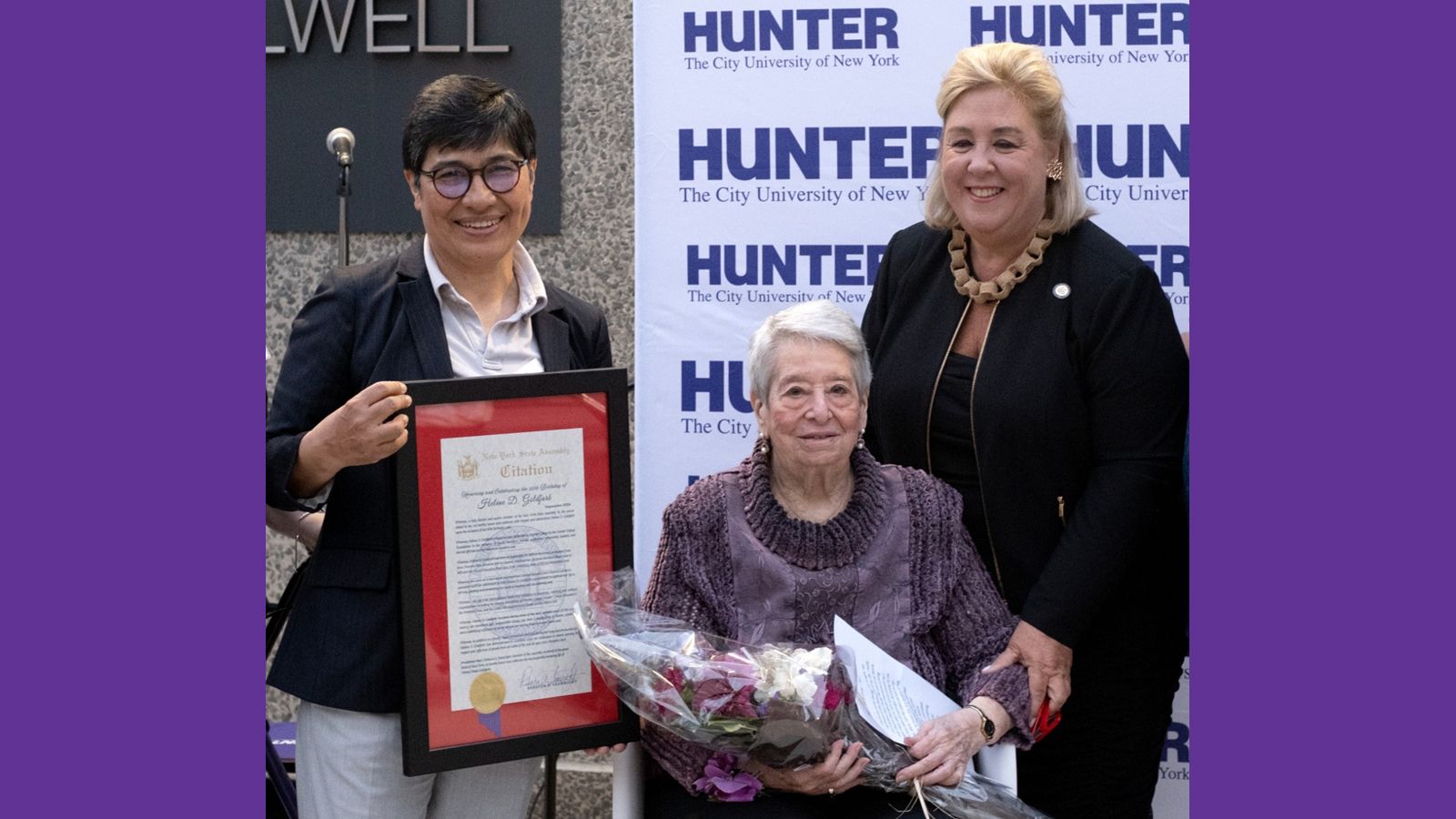 Helene Goldfarb, center, received a proclamation from Assemblymember Rebecca Seawright (right) held by Seawright aide Flor De Maria Eilets.