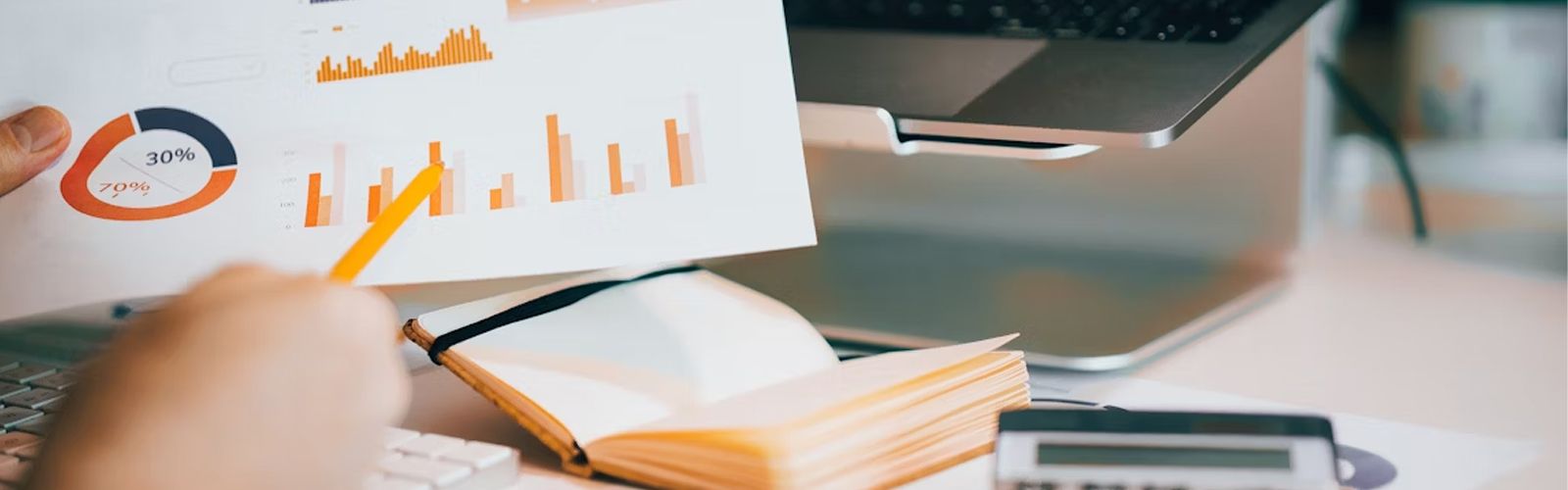 A person holding up a chart