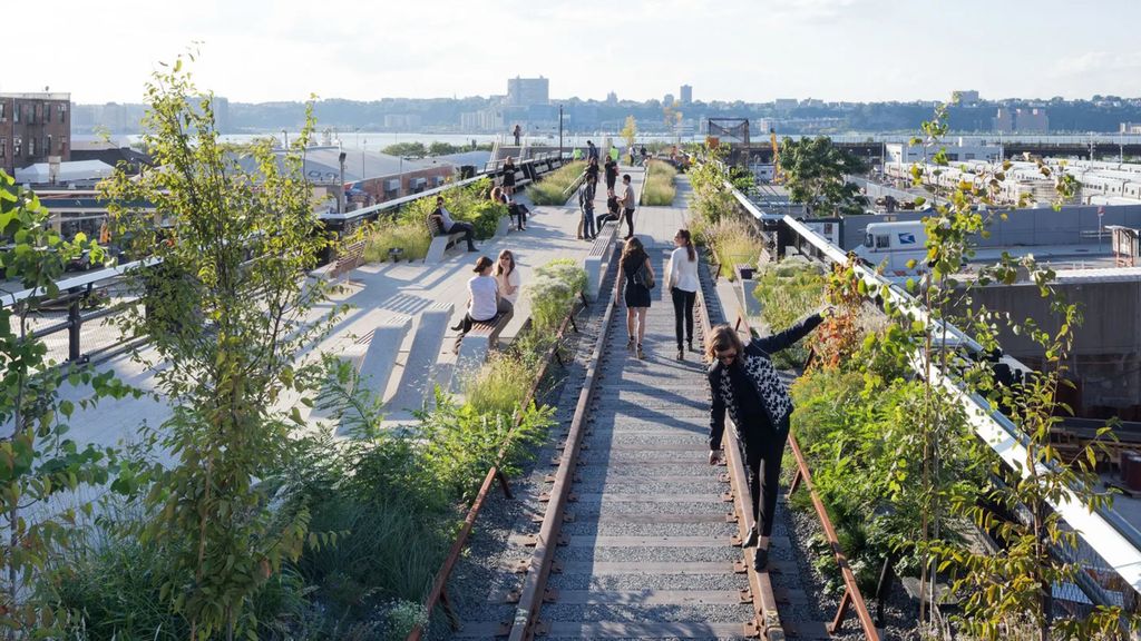 Photo of people walking and sitting on the High Line