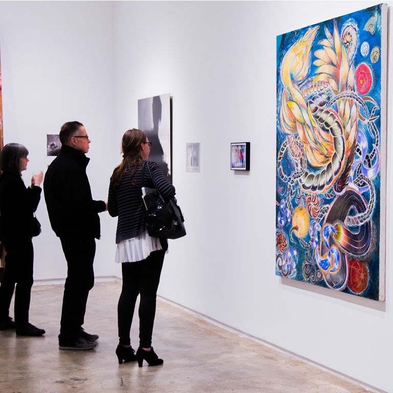 Patrons at an art exhibit