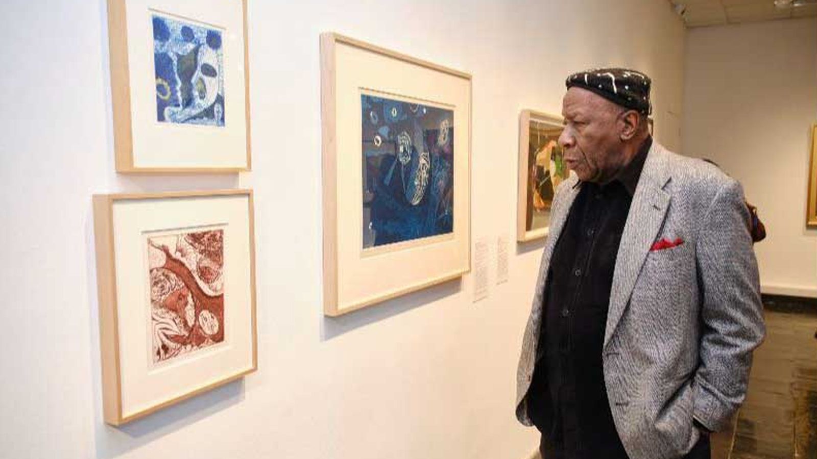 A person viewing art at a gallery