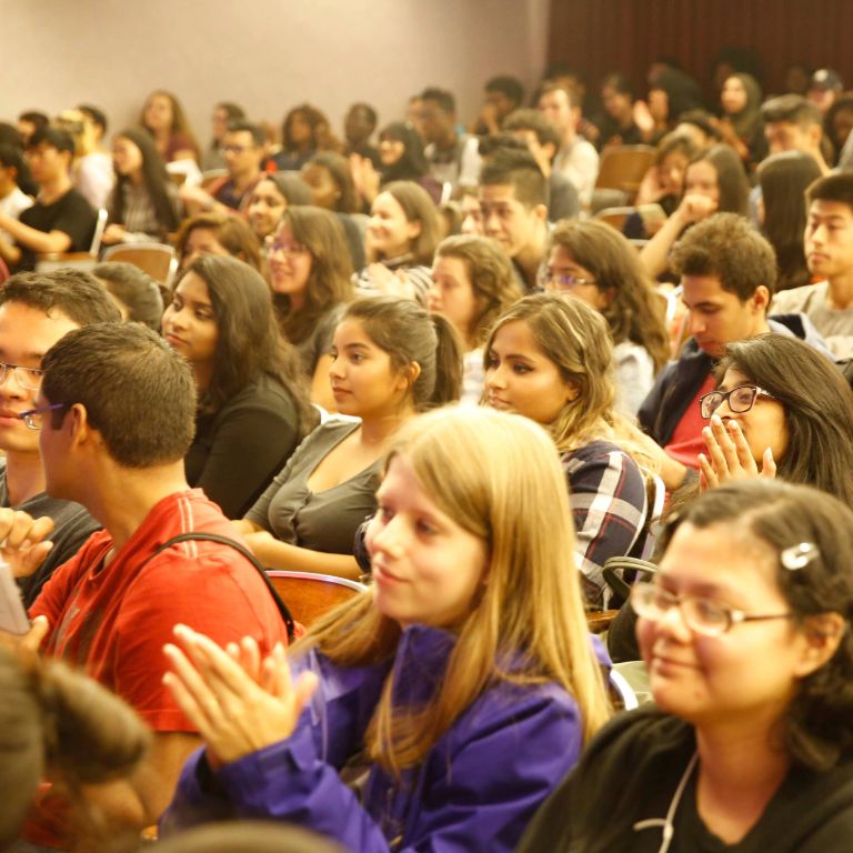 Hunter College students sitting in the auditorium.