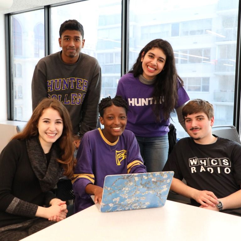 Hunter College students in the library.