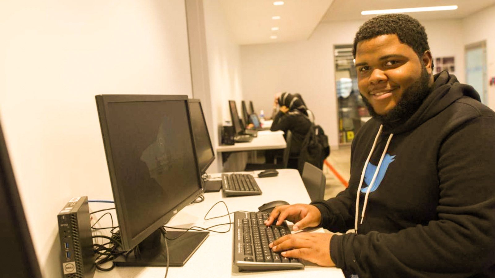 student at lab computer