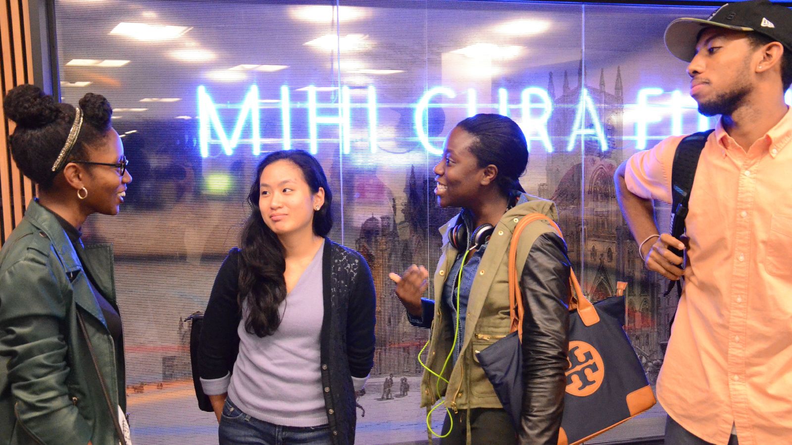 students at visitor's desk