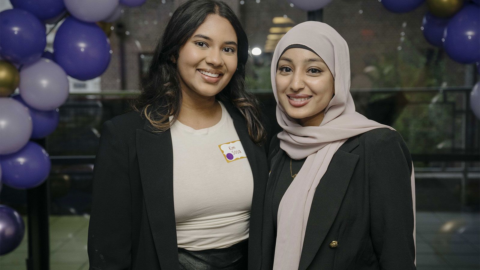 two cooperman students at Business Club Gala event