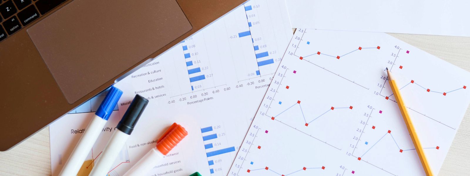 Statistics paper with markers and pencil.