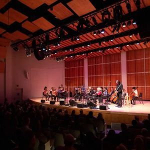 Musicians perform on stage at Kaufman Music Center.