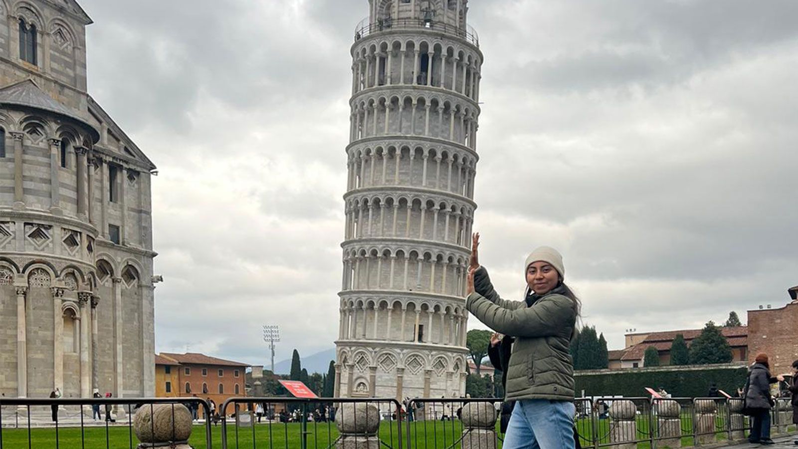 Hunter student at leaning tower of Pisa in Italy