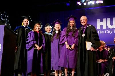 george mitchell on stage at Hunter commencement