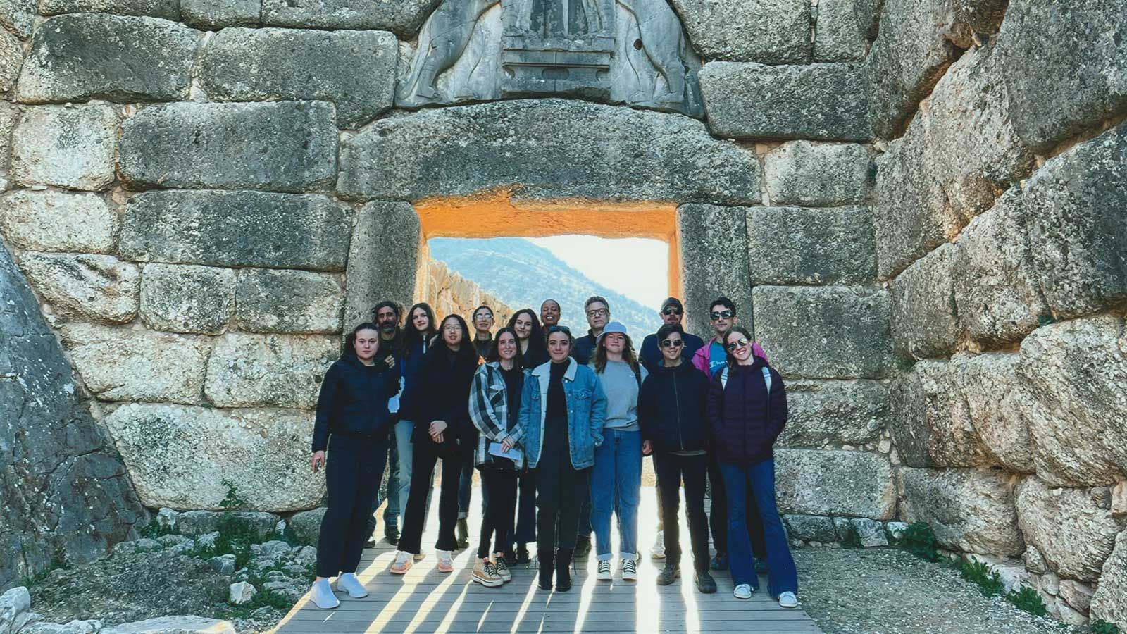 Mycenae group of students in ancient doorway