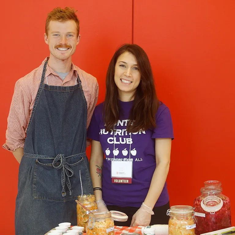 Students form the Nutrition Club at a table 