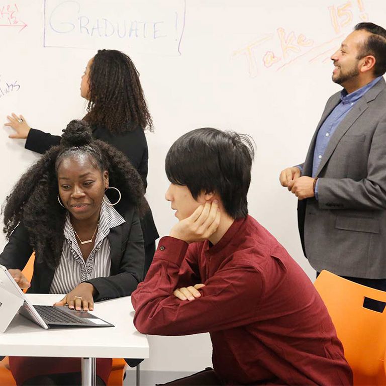 Hunter College students meeting with career advisors