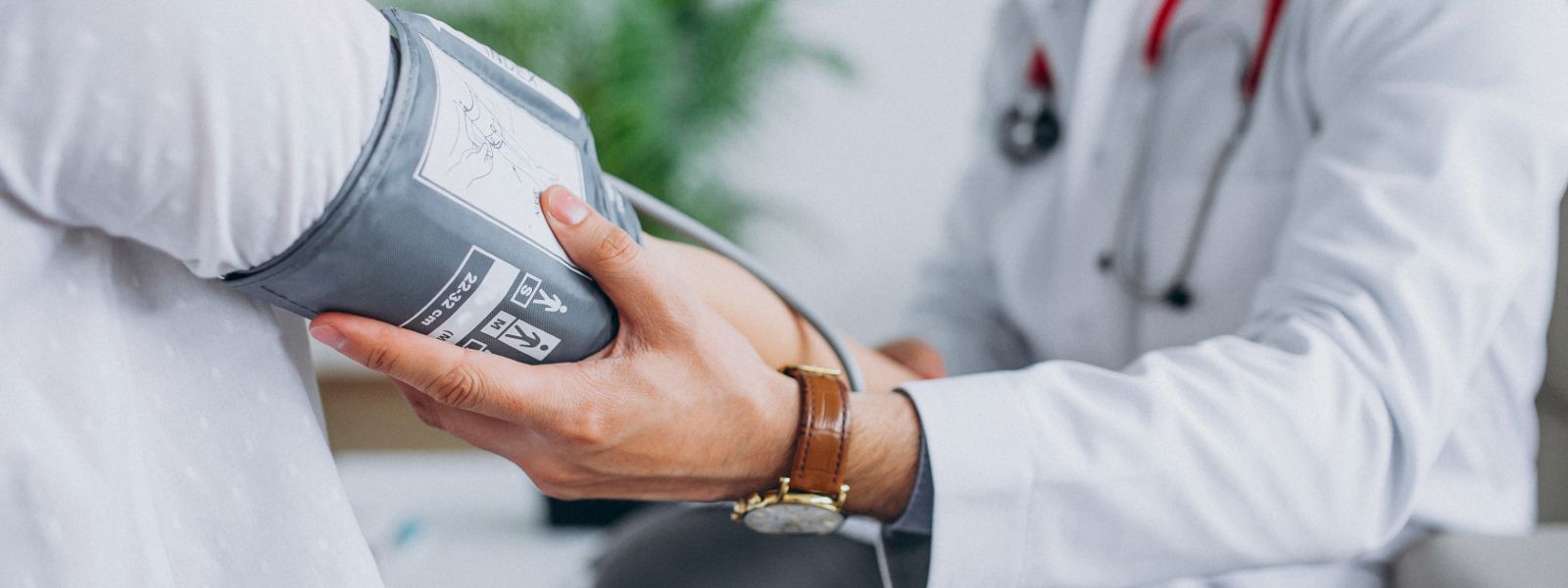 patient getting blood pressure checked.