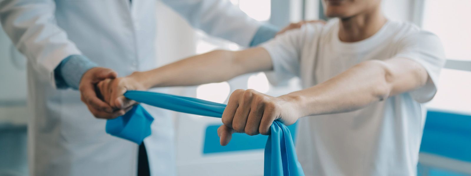 Two people in a physical therapy session.