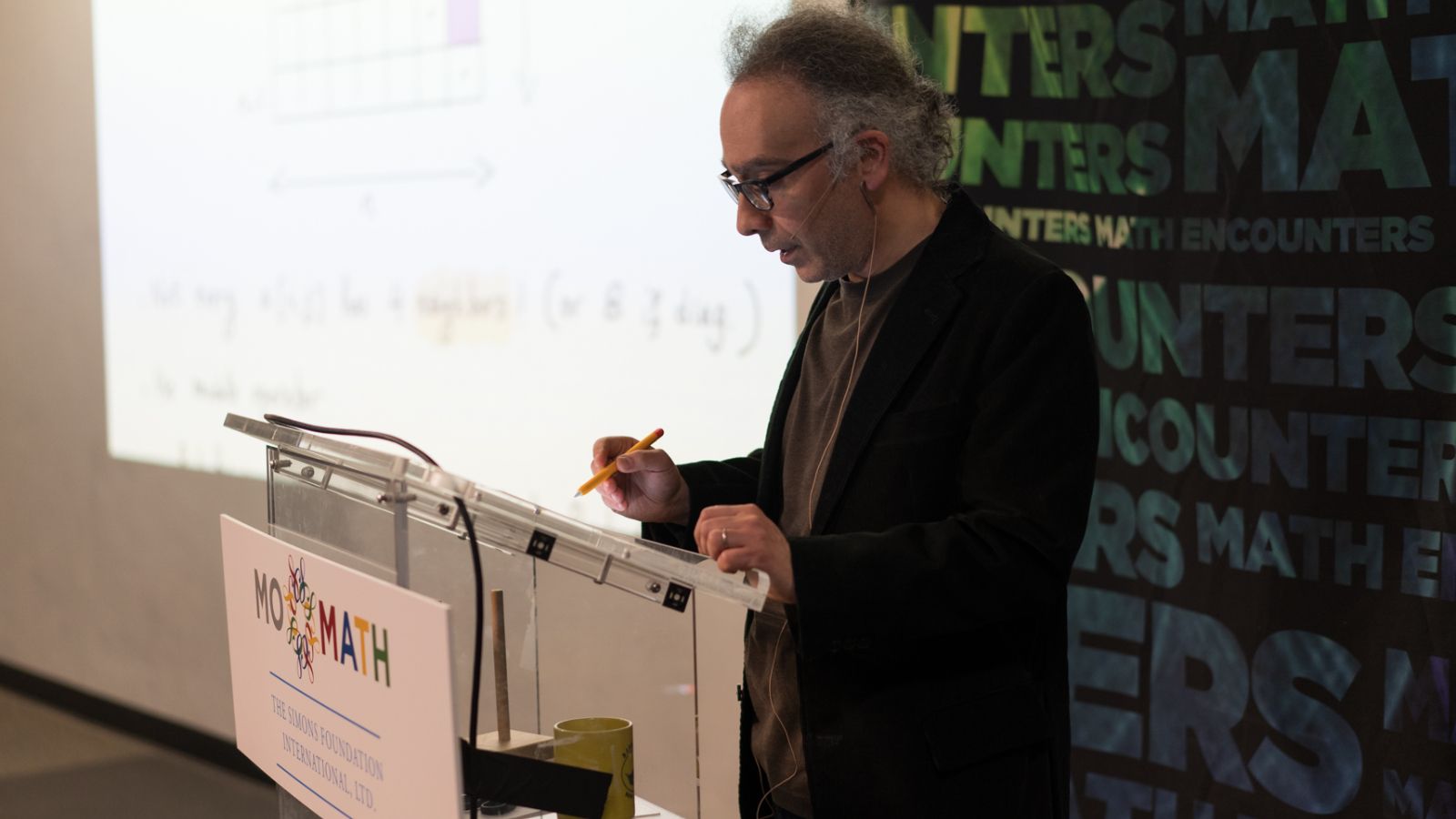 Professor Saad Mneimneh gives a talk at the National Museum of Mathematics