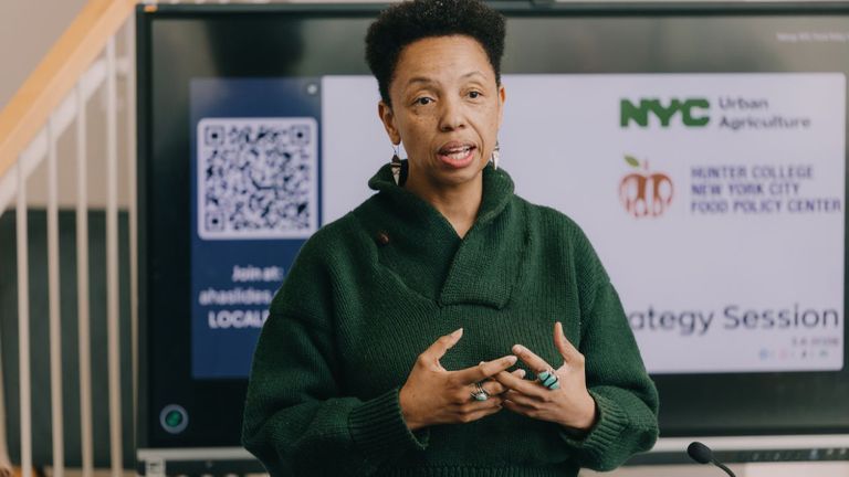 Qiana Mickie, director of the NYC's Mayor's Office of Agriculture, addresses attendees of the strategy session.