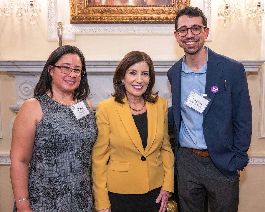 Left to right: Rosa Cruz Cordero, Governor Kathy Hochul, and Jorge R. Soldevila Irizarry posed at SOMOS.