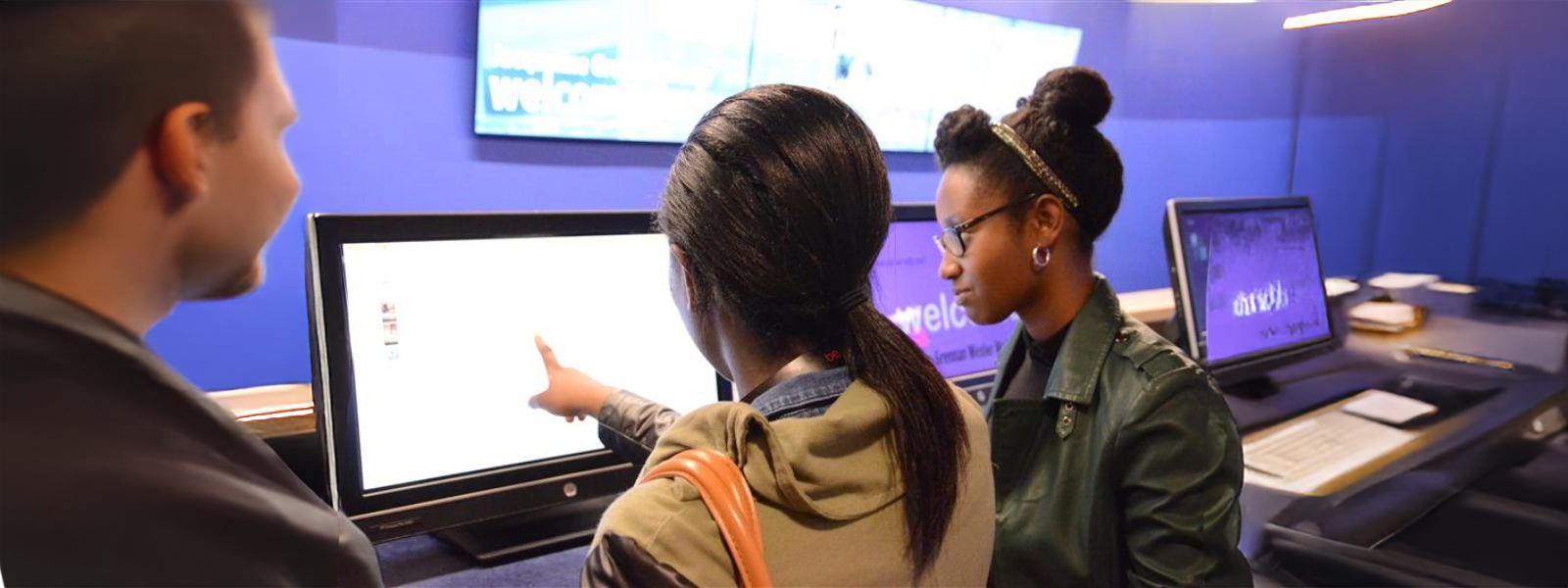 students working on a computer