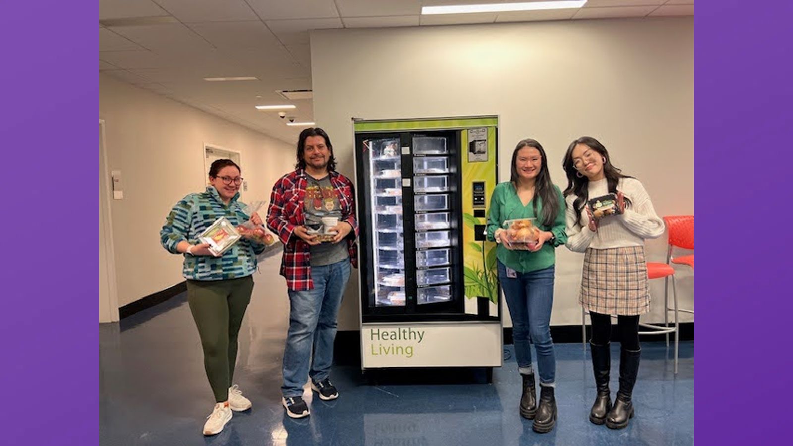 Students from the Silberman School of Social Work display healthy items from the Smart Pantry