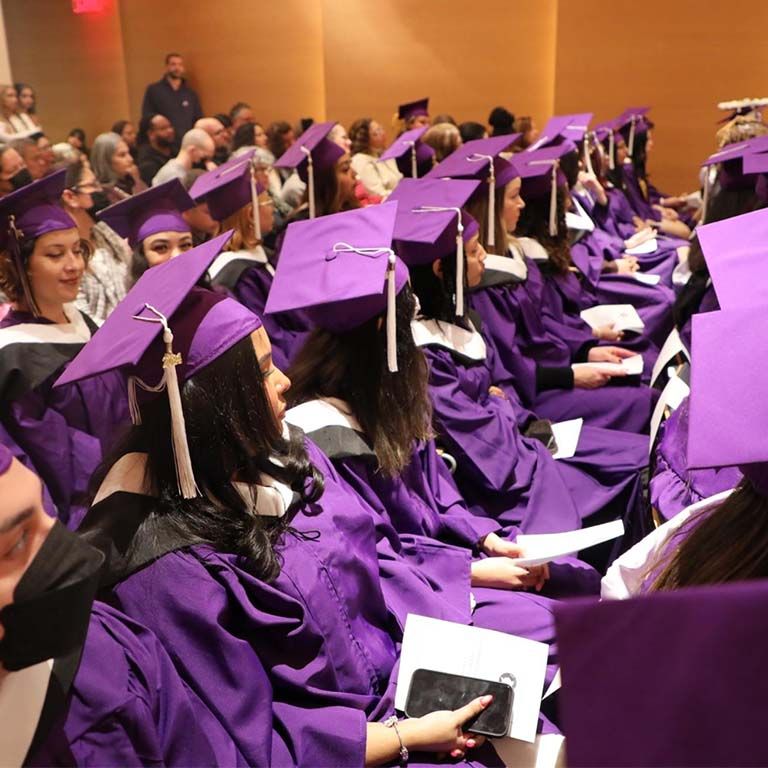 Sociology graduates in their caps and gowns. 